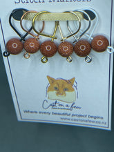Load image into Gallery viewer, Pop On A Few "Precious" - 9mm Stitch Markers, Blue/Brown/Green Goldstone Beads