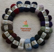 Load image into Gallery viewer, Nevalea alpaca 4ply yarn laid out in a ring formation; full colour range.

