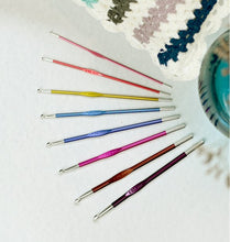 Load image into Gallery viewer, KnitPro Zing Crochet Hook Set, individual colourful single-ended hooks laid out in sunray pattern, 9 hooks in sizes ranging from 2mm to 6mm